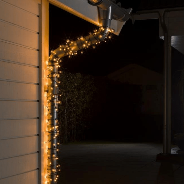 LED Lichterkette - 600 bernsteinfarbene LED - L: 41,93m - schwarzes Kabel - Trafo - für außen